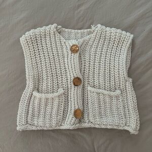 Knitted cream vest with gold buttons
